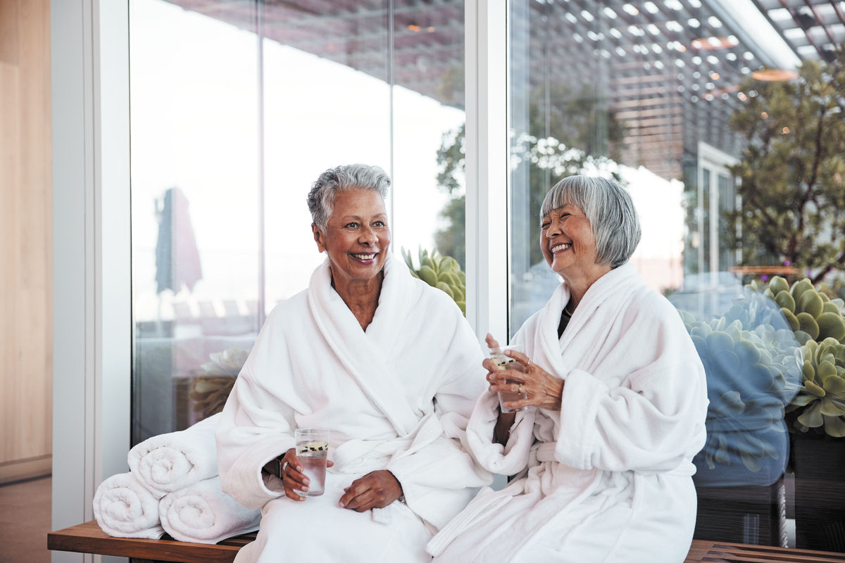 Two senior woman enjoying water in the spa