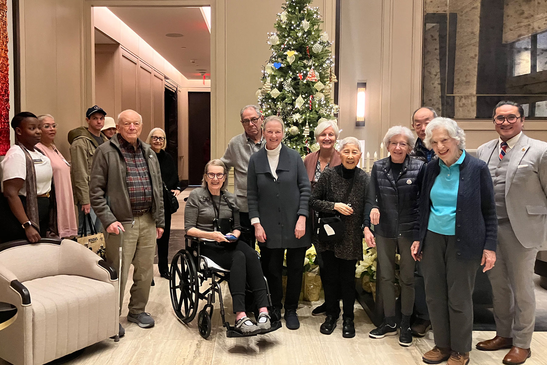 Coterie Hudson Yards residents photograph together at holiday party